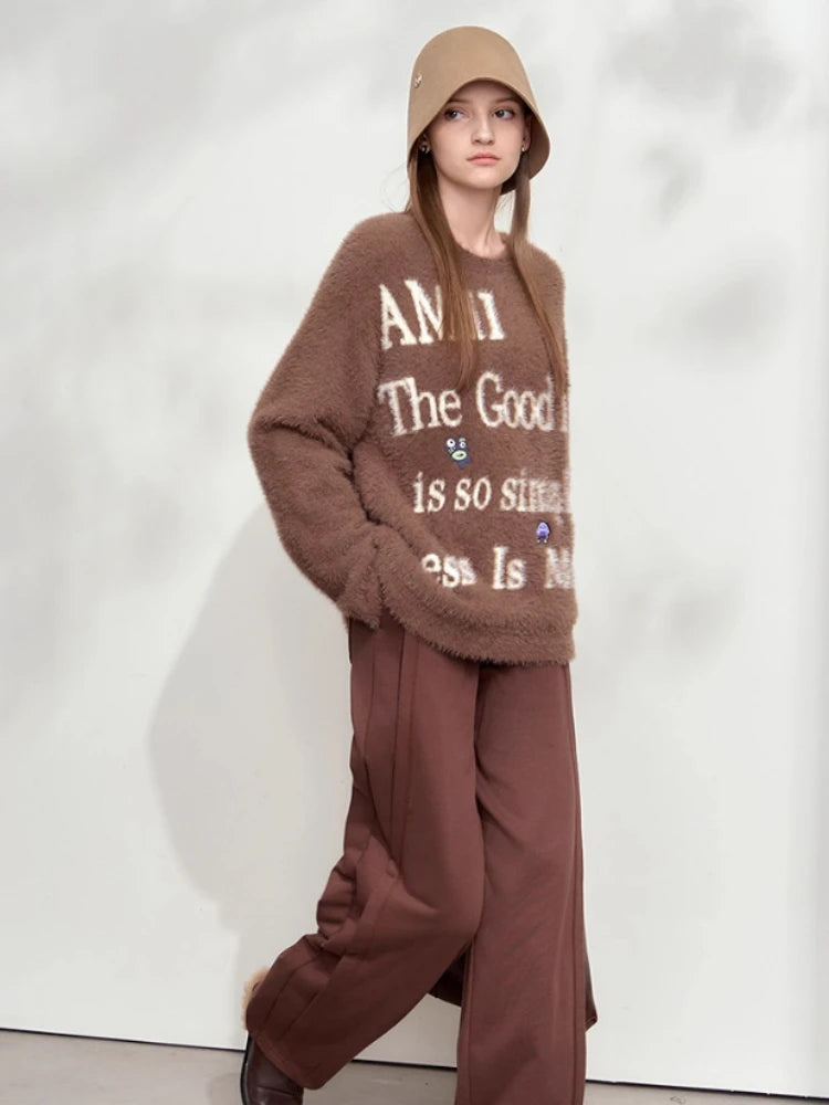 Damenpullover aus weichem Strick in Camel mit Rundhalsausschnitt und Frontdruck