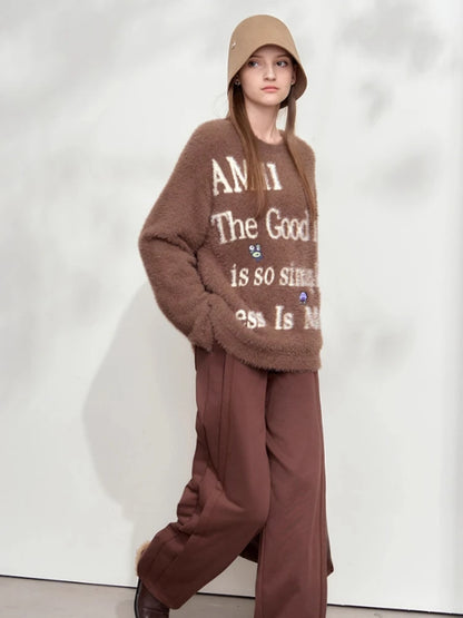 Damenpullover aus weichem Strick in Camel mit Rundhalsausschnitt und Frontdruck