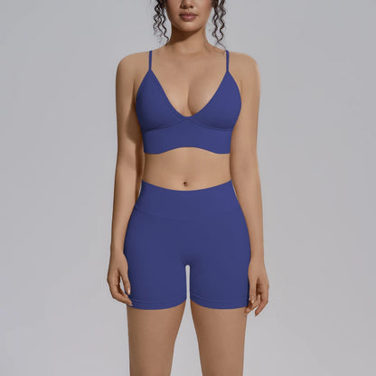Damen Yoga-Set in Navy: BH mit Trägern und Hotpants mit hoher Taille, vorne
