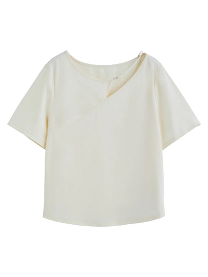 Beige Damenbluse mit Puffärmeln und Umlegekragen, einreihig mit Knopfverzierung – leichtes, kurzes Design