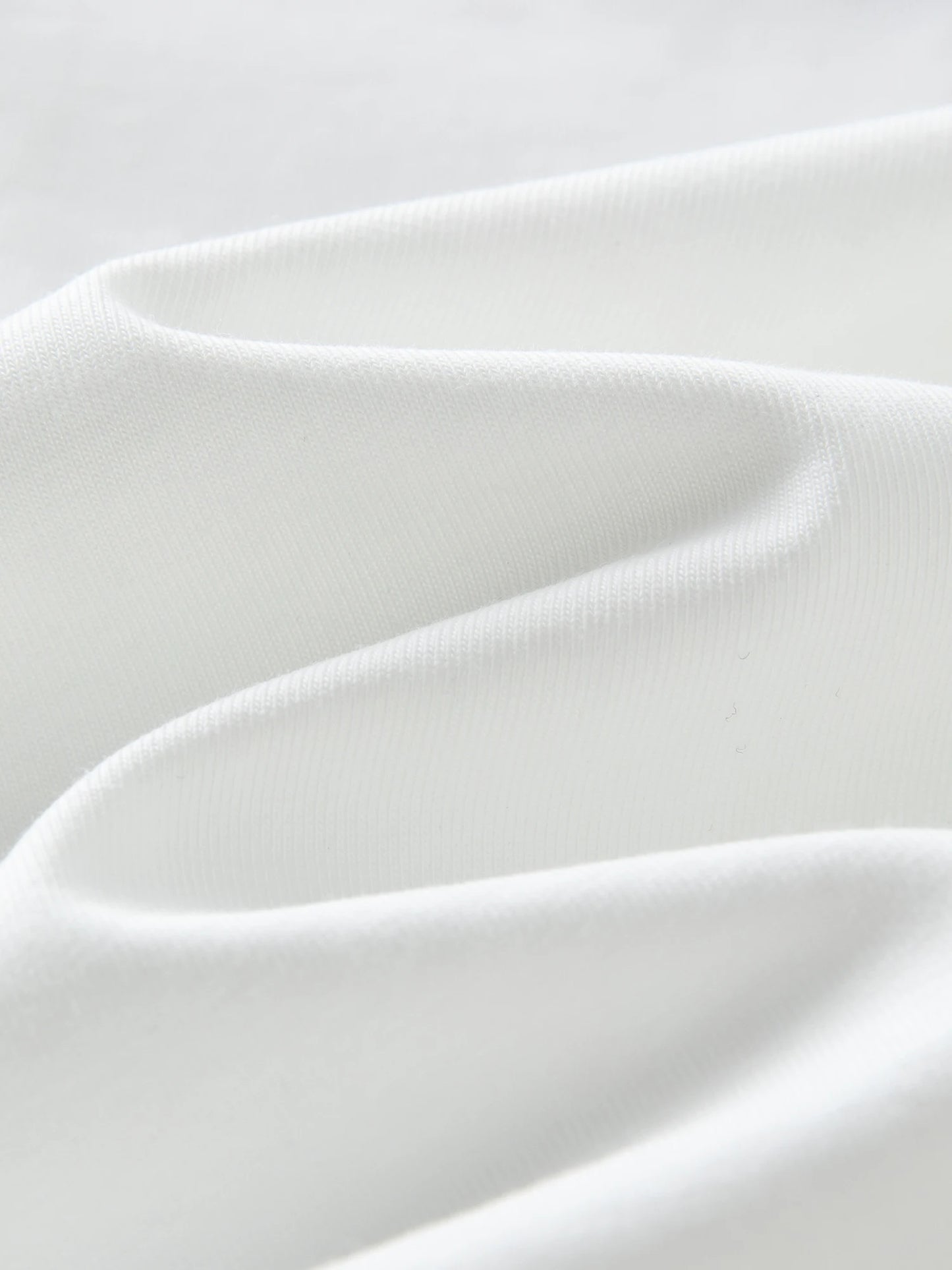 Damen T-Shirt mit V- und U-Ausschnitt, hoher Stretch und strukturierten Schultern – elastische Baumwolle im Y2K-Stil für den Sommer.
