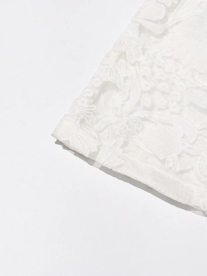 Elegantes ärmelloses Damen-Kleid mit trägerlosem Patchwork-Design und Diamantdetails – figurbetont und luxuriös.
