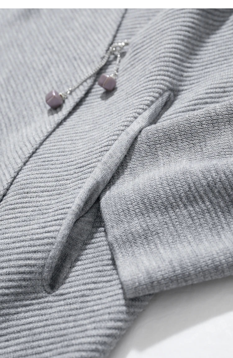 Damen-Strickjacke Wolle Umlegekragen lang locker Tasche Herbst