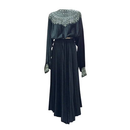 Elegantes Damenkleid mit Rundhalsausschnitt und langen Ärmeln – Patchwork-Design mit Perlen für einen stilvollen Auftritt.