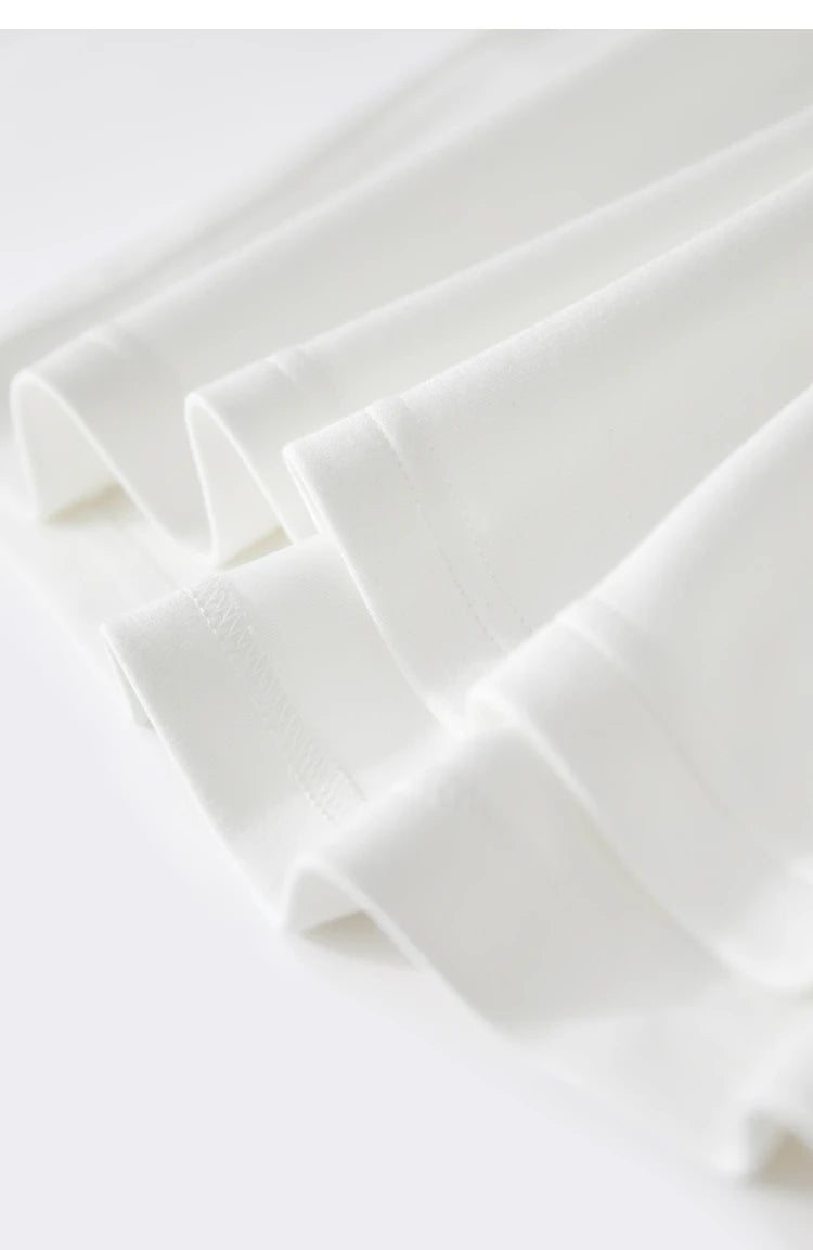 Damen T-Shirts im minimalistischen Stil mit Stickerei und O-Ausschnitt