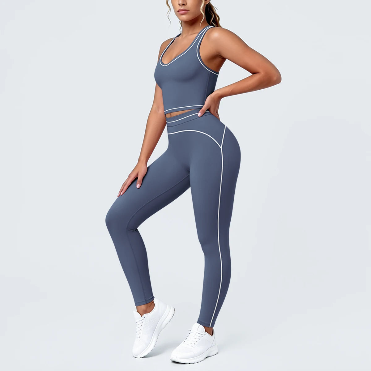 Yoga-Set aus Sport-BH-Top und Leggings, blau-grau, mit Paspel-Details an Seiten