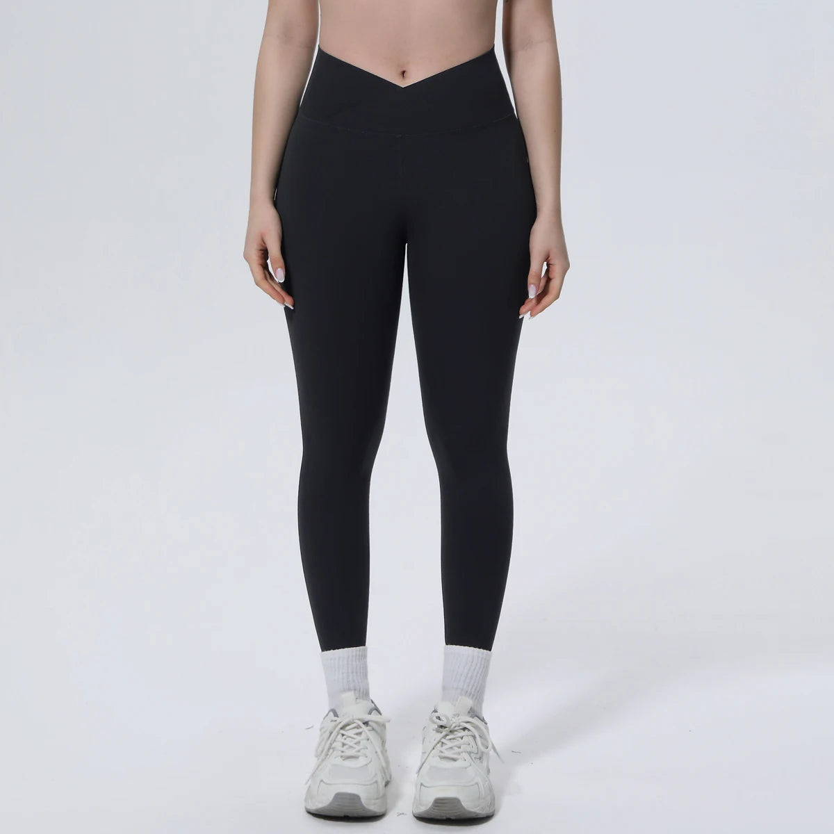 Nahtlose schwarze Yoga-Leggings für Damen mit überkreuzter Taille