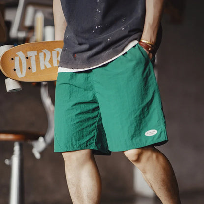 Herren Shorts im sportlichen Funktionsstil mit elastischer Taille und Taschen