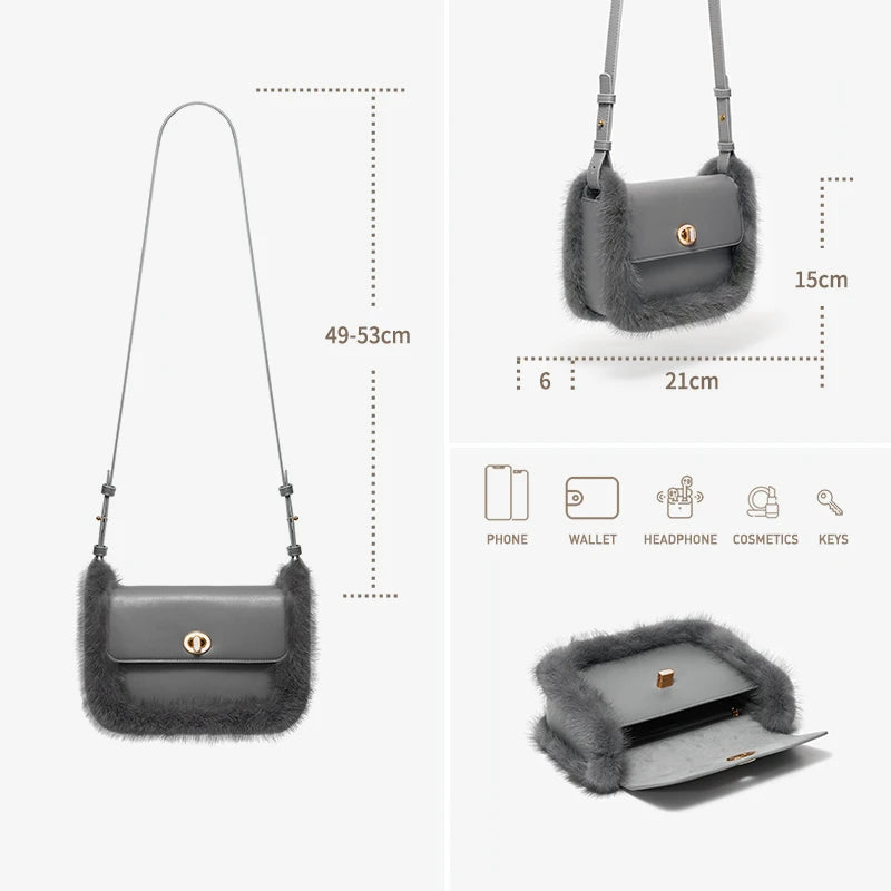Graue Schultertasche mit Fellbesatz, Umschlagklappe und goldener Verschlussöse