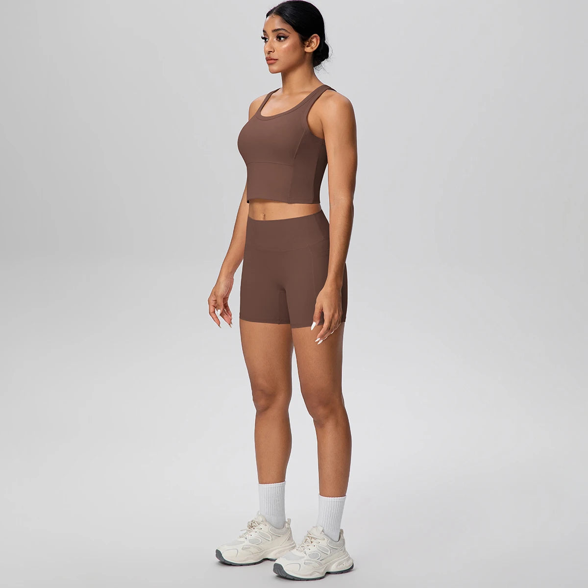 Damen Fitness-Set aus Weste und Laufshorts, braun, Seitenansicht
