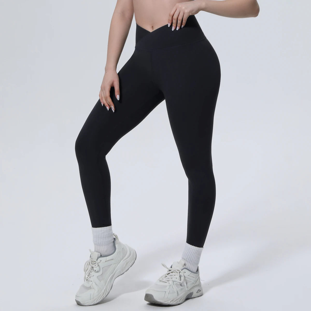 Nahtlose schwarze Yoga-Leggings für Damen mit überkreuztem Bund und Knöchellänge