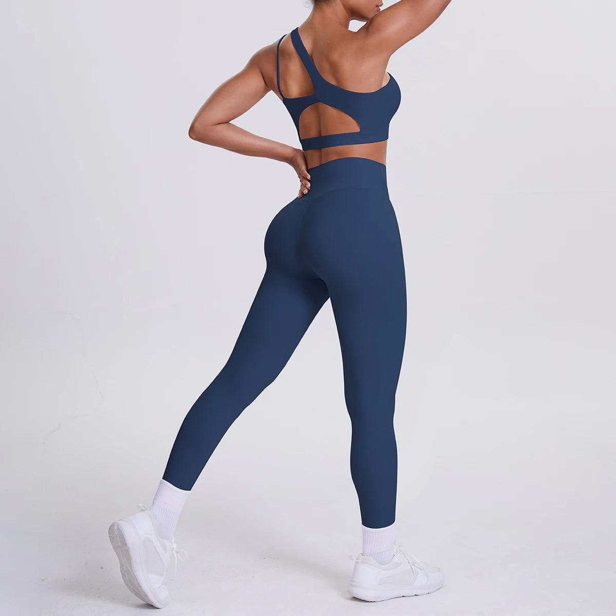 Yoga-Set Damen: dunkelblaues Sport-Set mit Rücken-Cutout und Leggings