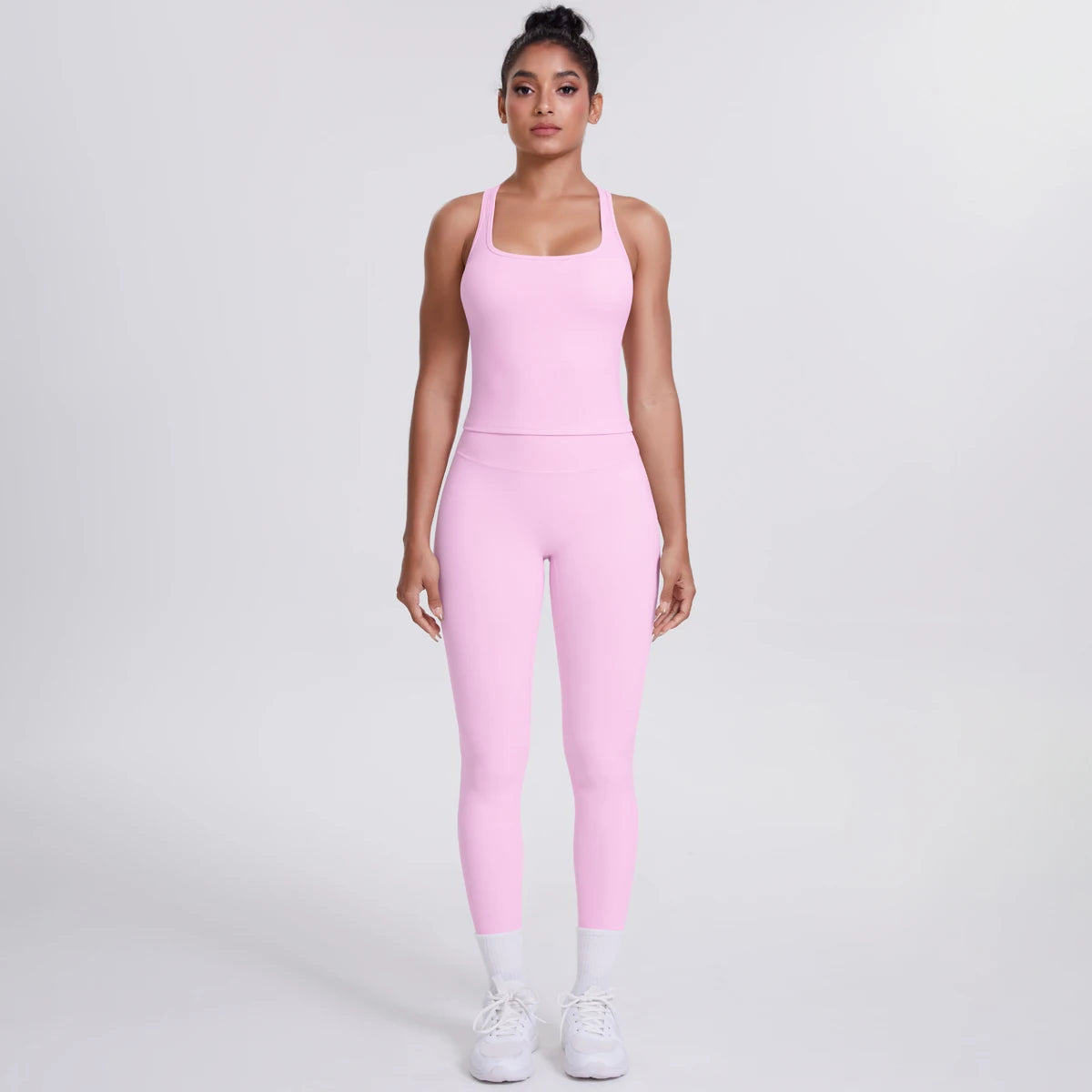 Damen Yoga-Set mit Trägertop und 3/4-Leggings, einfarbig rosa, Frontansicht