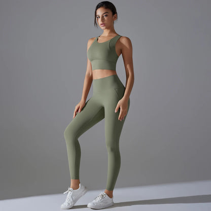 Damen-Yoga-Set in Grau-Sage: ärmelloses Crop-Top und lange Laufhose, figurbetont