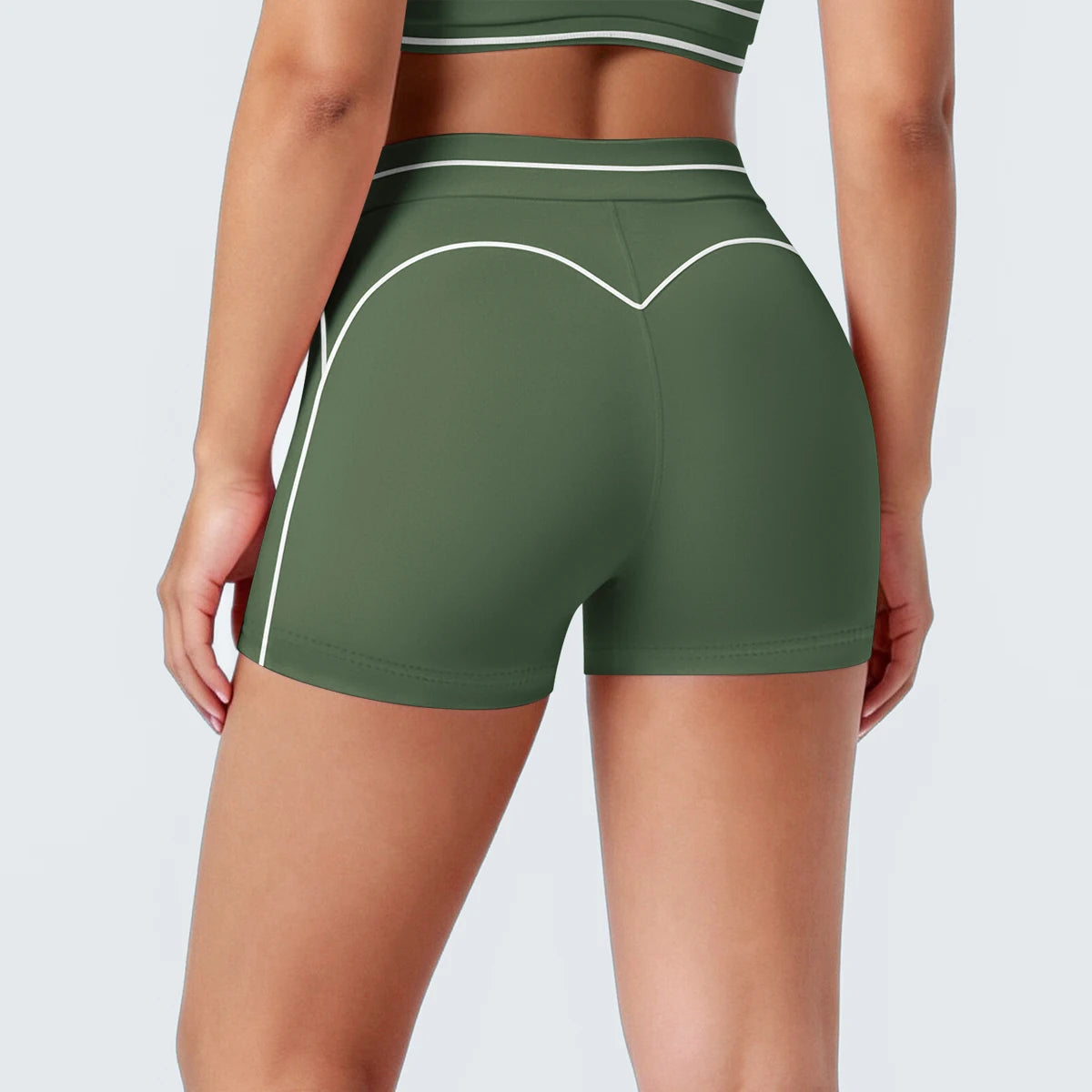 Damen Yoga-Shorts in Moosgrün mit weißen Kontraststreifen, seitliche Ansicht