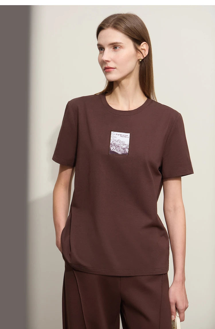 Damen T-Shirt aus Baumwolle mit lässigem O-Ausschnitt und modischer Stickerei