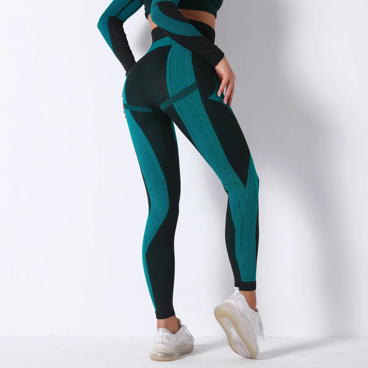 Hamidou nahtlose Yoga-Leggings, schwarz mit türkisen Musterstreifen