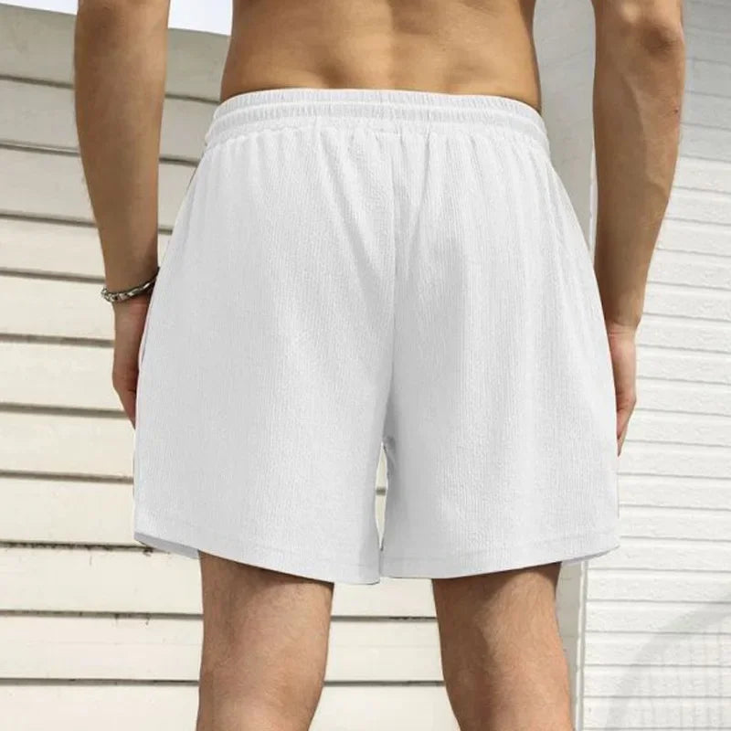 Leichte Herren-Sportshorts aus Eisseide – lockere, knielange Sommerhose in Schwarz