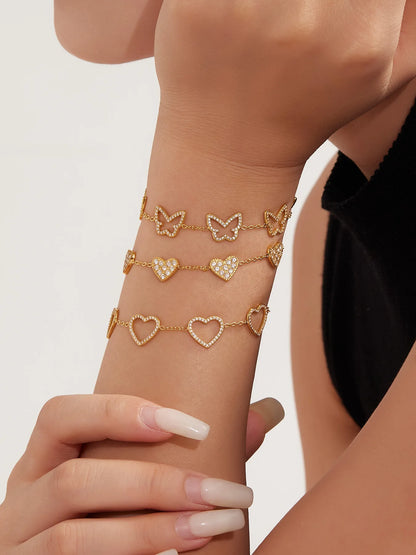 Damen-Charm-Armband mit Herzschleife und Zirkonia