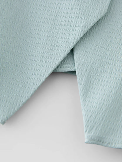Elastisches Damen-Strickshirt in Übergröße mit kurzen Ärmeln – stilvoll und ideal für den Sommer.