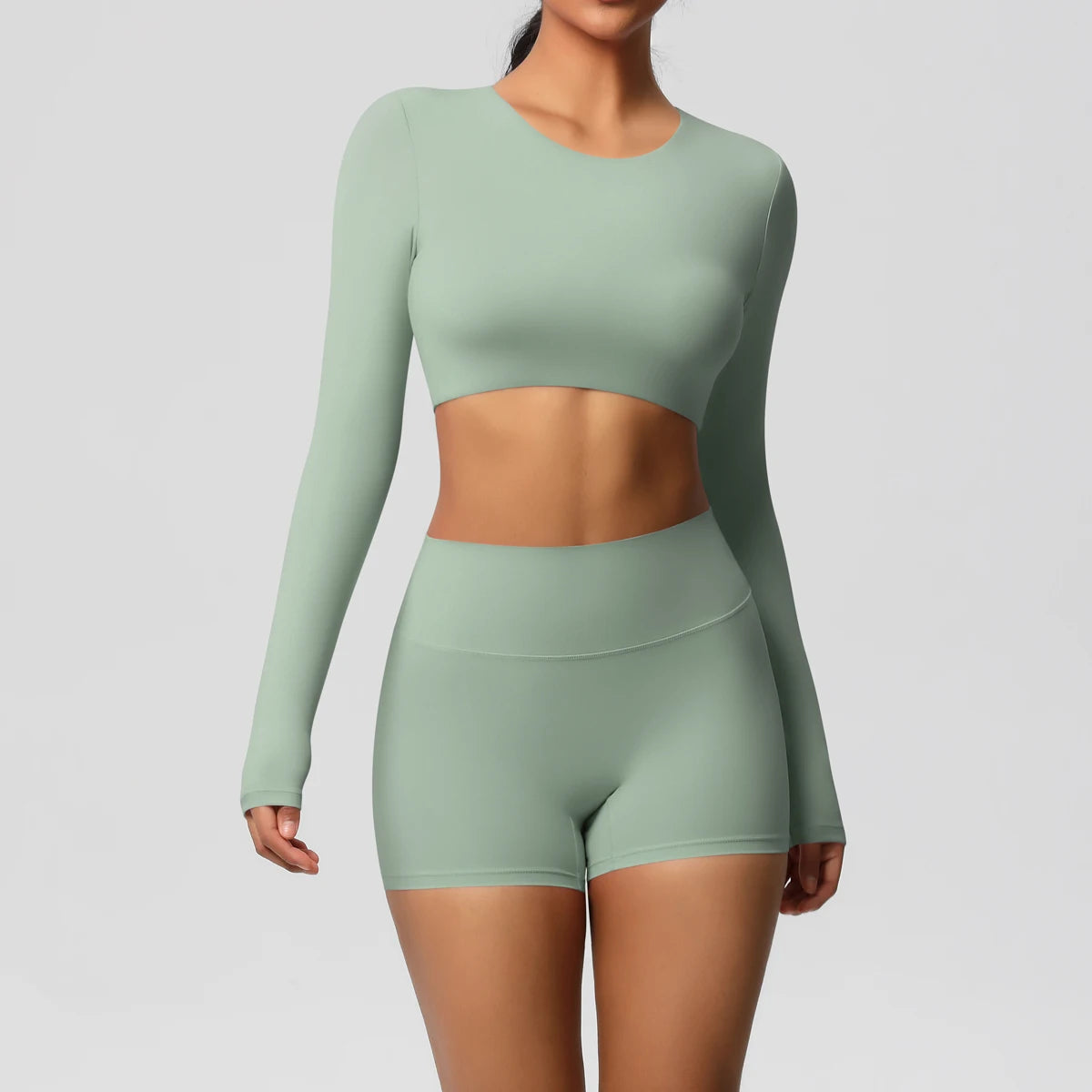 Damen Yoga-Set mit langarmigem Crop-Top und High-Waist-Shorts, hellgrün