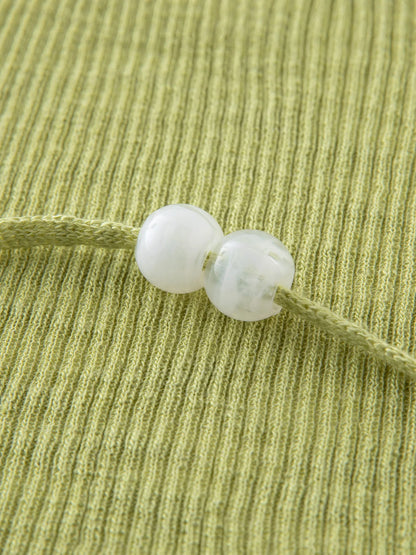 Damen-Polo-Shirt aus Baumwolle mit Polokragen, tailliertem Schnitt und abgerundetem Saum – ideal für den Sommer und den Alltag
