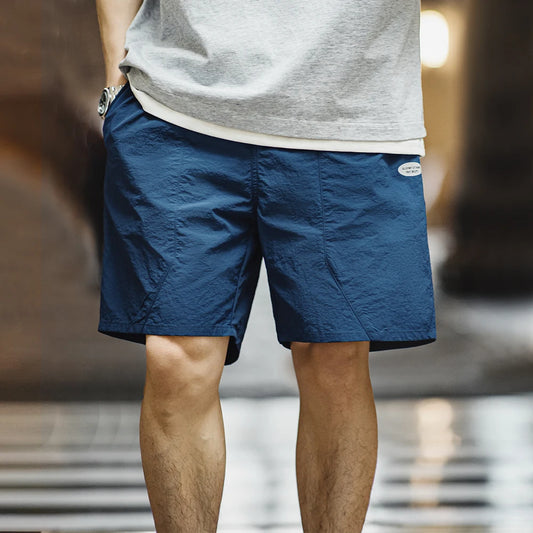 Männer Plissee-Shorts aus schnell trocknendem Polyamid mit elastischer Taille
