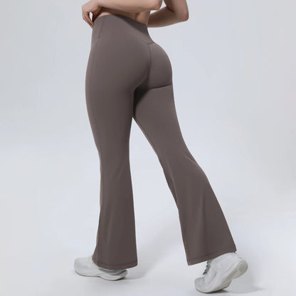 High-Waist Yoga-Leggings, braun, seitliche Ansicht mit weit ausgestelltem Bein