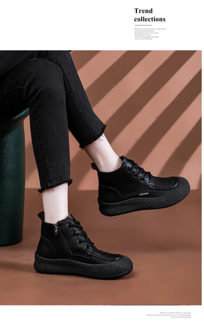 Damen-Ankle-Boots mit Schnürung, rundem Zeh, flacher Sohle in Dunkel-Schwarz.