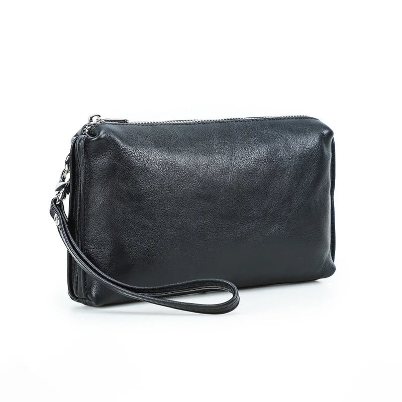 Schwarze Herren-Ledertasche mit Reißverschluss und seitlicher Trageschlaufe, kompakt