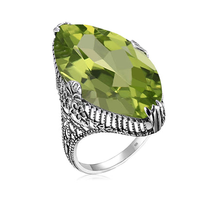 Damen-Ring aus Silber 925 mit Olivgrünem Peridotstein in Filigraner Silberfassung Luxus Schmuckstück