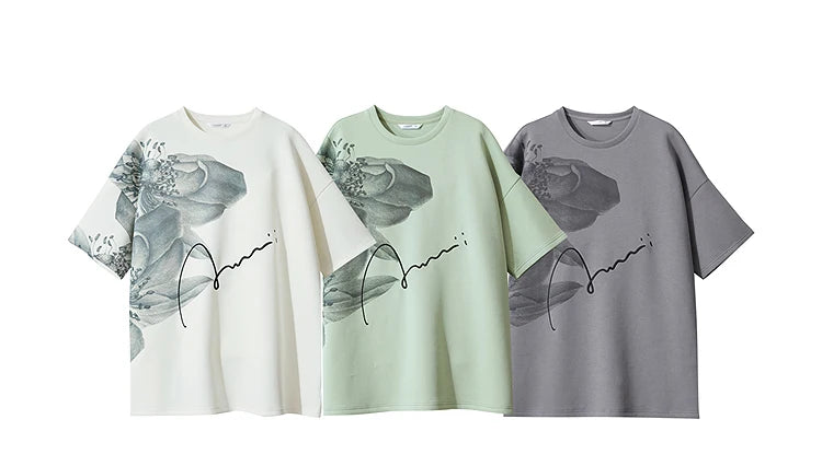 Damen T-Shirt mit lockerem O-Ausschnitt und Blumenmuster sowie Stickerei