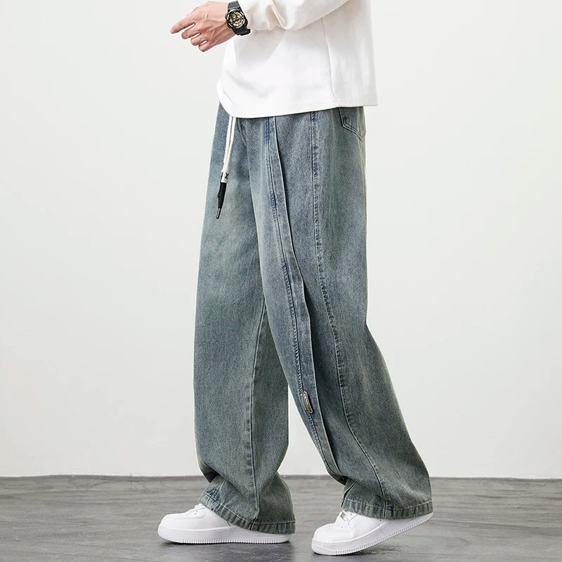 Herren Jeanshose mit brauner Stickerei im Hip Hop Stil