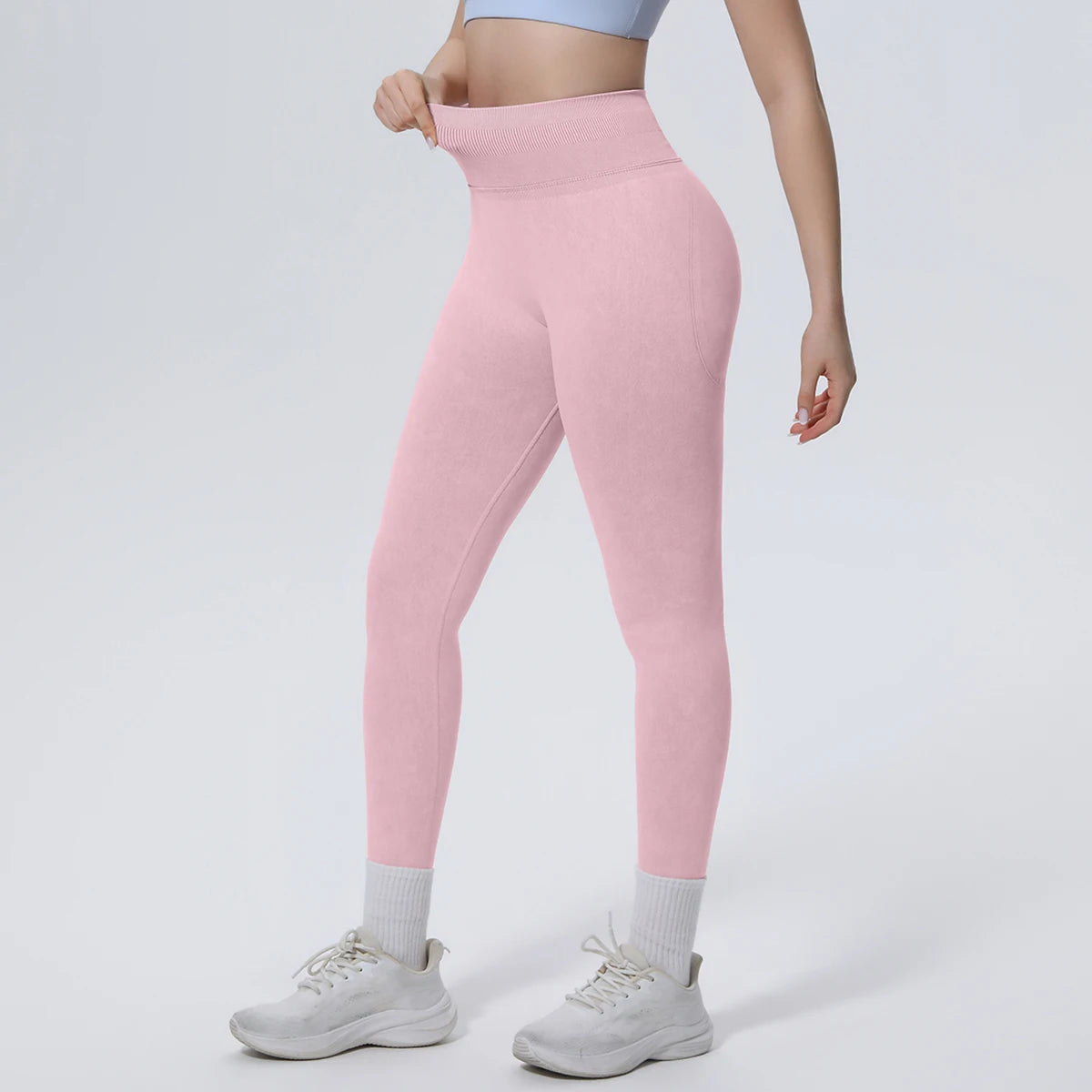 Rosa Yoga-Leggings mit nahtbetontem Sitz und schlankem Beinverlauf
