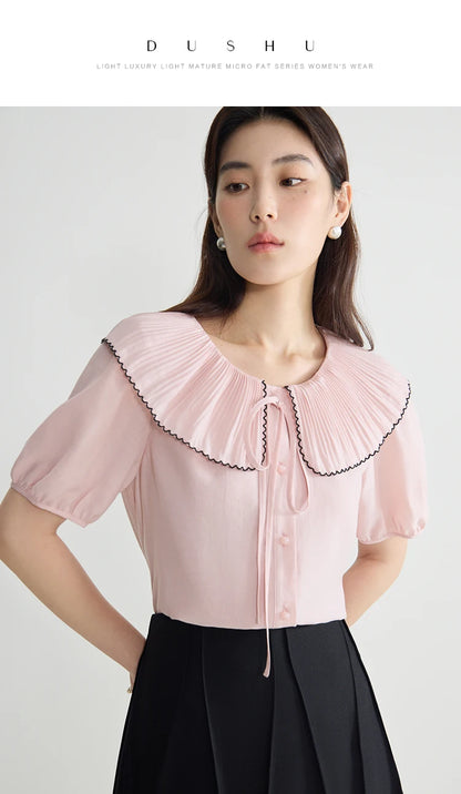 Elegante schwarze Bluse mit französischem Flair und figurformender Silhouette – Sommer-Textur für große Größen