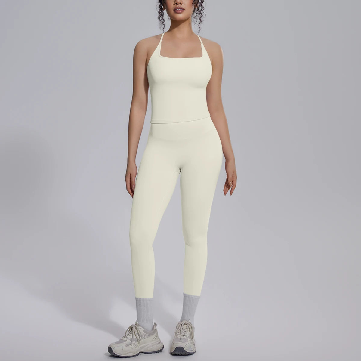 Damen-Yoga-Set mit Leggings, cremeweiß, Frontansicht mit schmalen Trägern