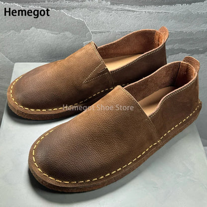 Herren-Leder-Slipper in Braun mit runder Zehenkappe, Ziernähten und dicke Sohle