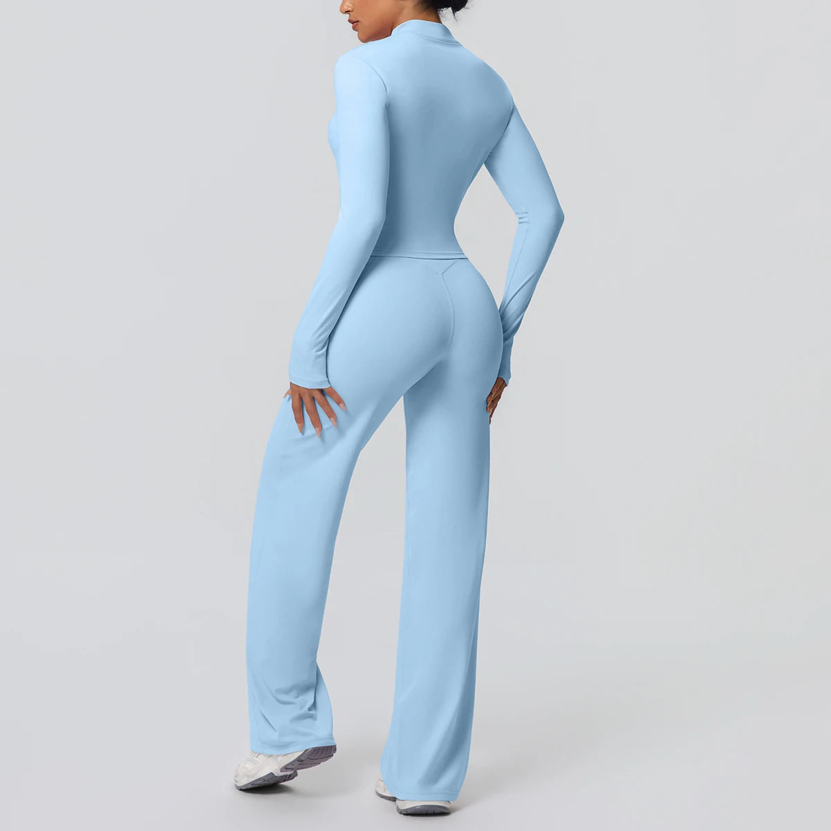 2-teiliges Yoga-Set in Hellblau seitlich: Zip-Top und lange, weit geschnittene Hose