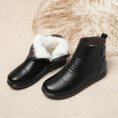 Damen-Winterstiefeletten in Schwarz mit weißer Wollfütterung, kurzer Schaft, Profilsohle
