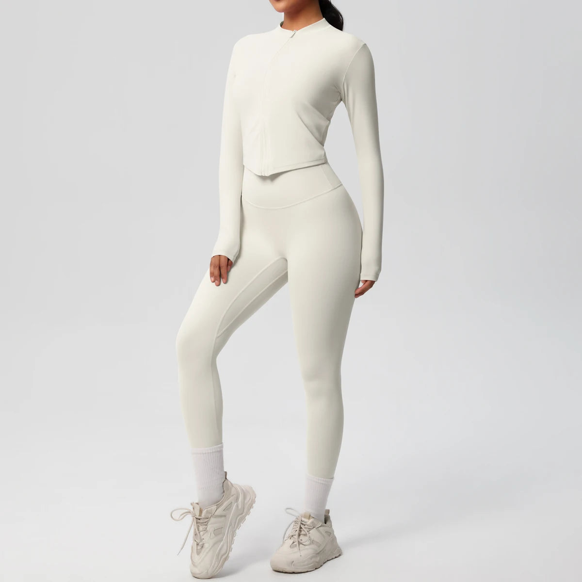 Zweiteiliger Damen-Yogaanzug, Slim Fit, langärmeliges Oberteil und Leggings in Hellivory