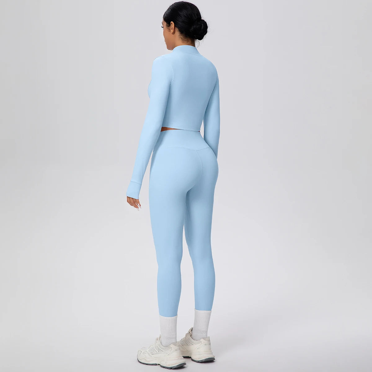 Hellblaues Damen-Yogaset mit Reißverschluss-Sportshirt und Leggings, Rückansicht