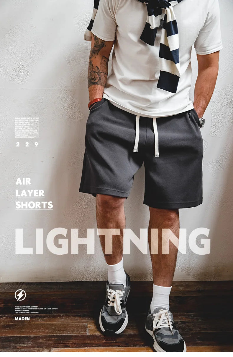 Herren Freizeitshorts aus atmungsaktivem Material mit gesticktem Blitzdesign