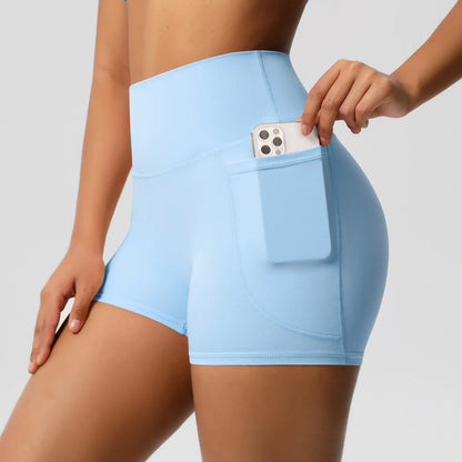 Hamidou Yogashorts für Frauen in Hellblau mit Reißverschluss-Tasche für Smartphone.