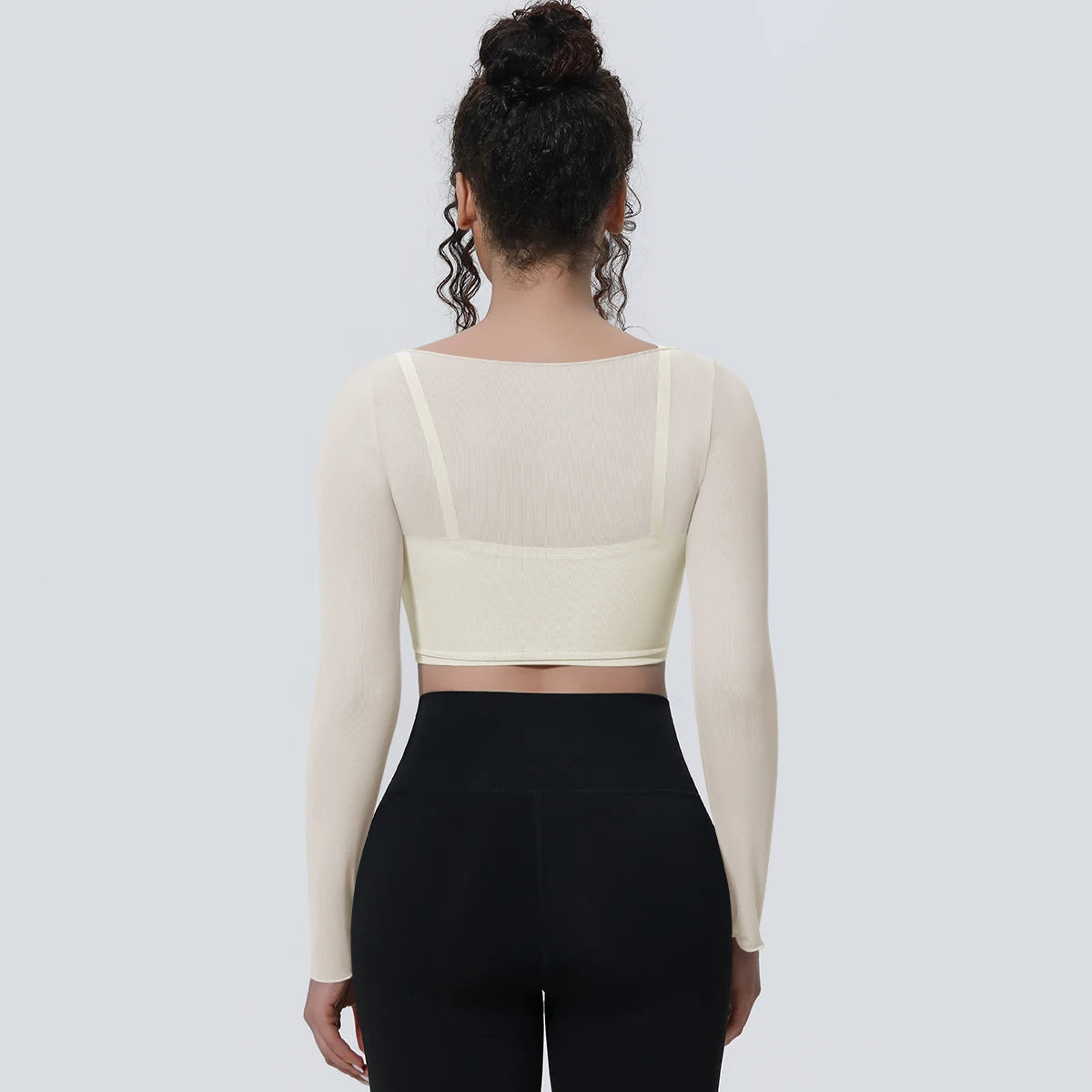 Damen Langarm-Yoga-Shirt in Creme: Rückansicht mit transparenten Bahnen und schmalem Saum