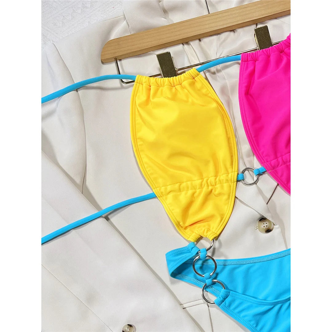 Damen Badeanzug Neckholder Cut-Out rückenfrei Monokini hoher Beinausschnitt gepolstert