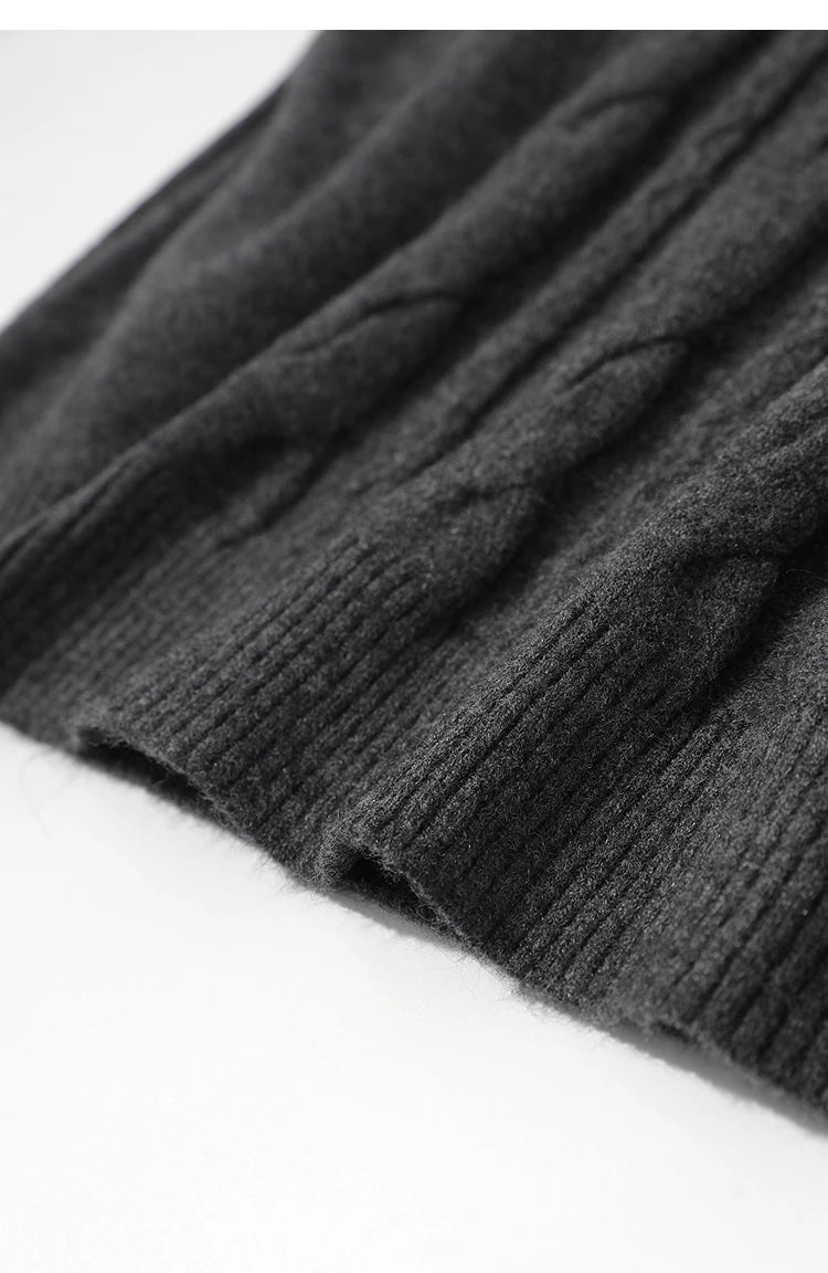 Dunkelgraue Strickweste mit geripptem Saum und feiner Stricktextur