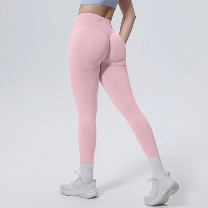 Nahtlose Yoga-Hose in Rosa, seitlich-hintere Ansicht mit figurformendem Schnitt