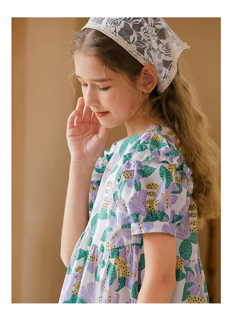 Kurzes Mädchen-Kleid mit Puffärmeln und Cheongsam-Design, Patchwork aus Gaze in Lila-Blau, mit Perlenknöpfen – für Kinder von 3 bis 12 Jahren.