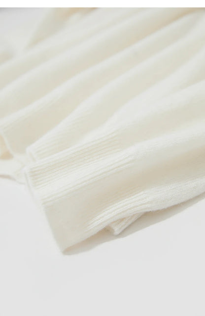 Damenpullover, O-Ausschnitt, lange Ärmel; gerippter Saum, cremefarben