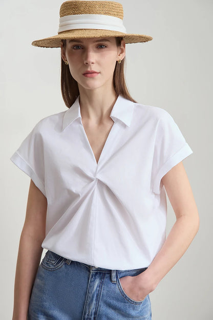 Damen Bluse im minimalistischen französischen Stil mit umlegekragen und gedrehten Falten